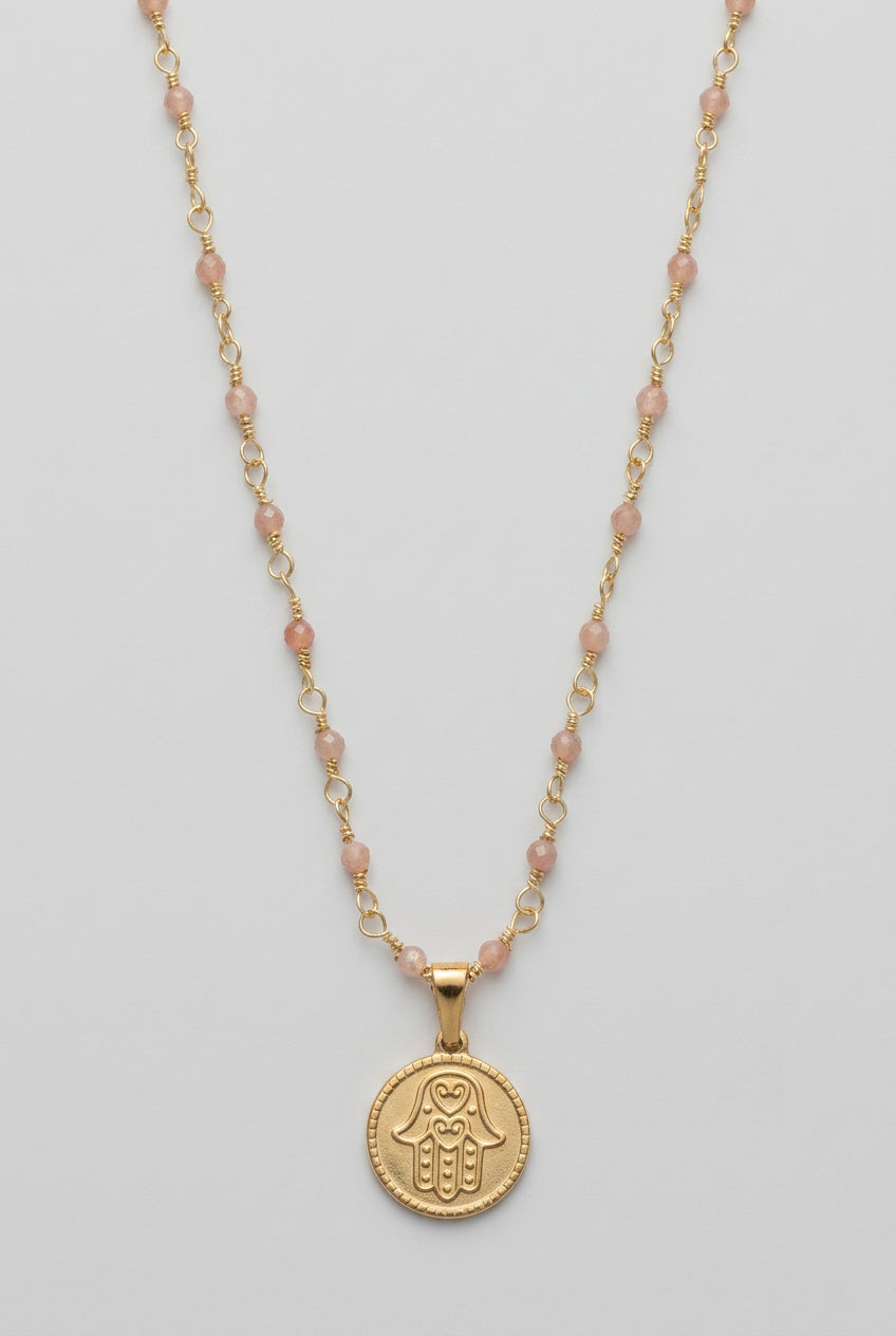 Hamsa Strength necklace on a sandstone beaded chain
