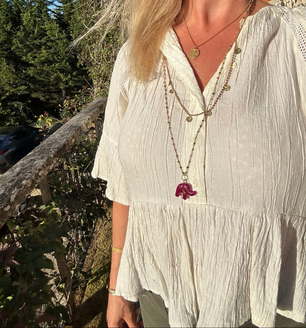 Circle of Light Necklace worn layered in natural sunlight