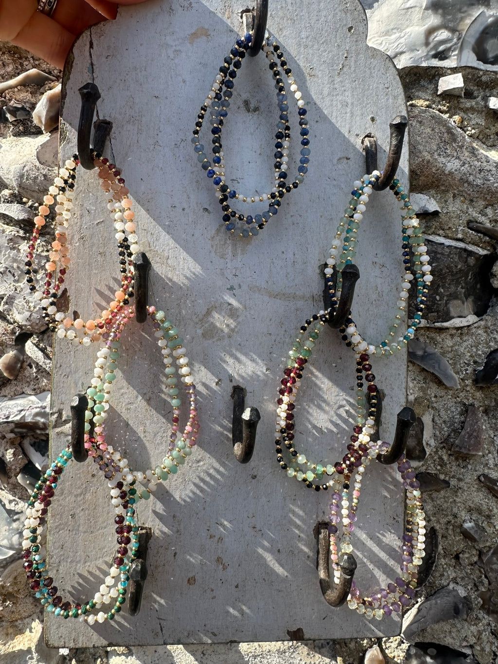 Alokaluca gemstone bracelet collection flat lay